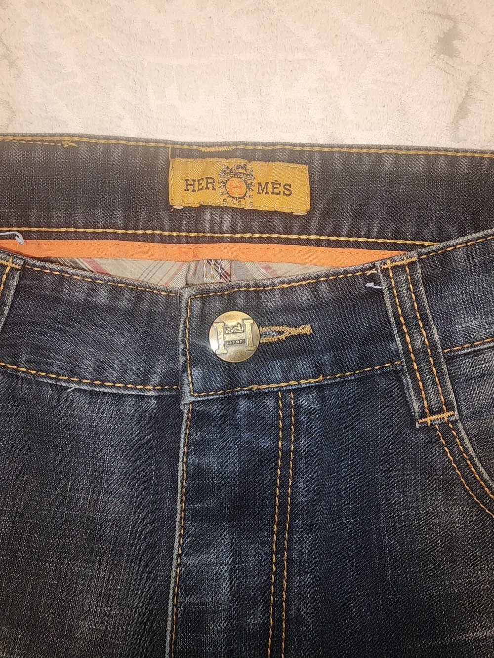 Hermes Denim Jeans with Multicolor Striped Lining and Orange Trim
